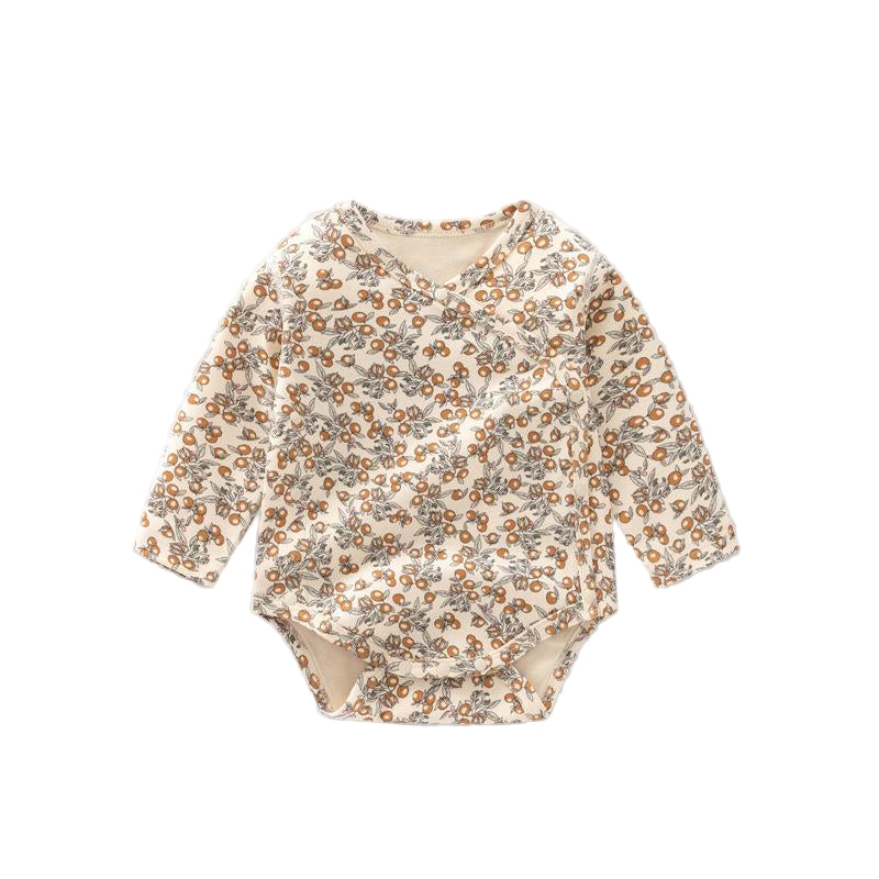 Floral-patterned baby onesie on a light gray background